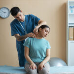 doctor helping patient rehabilitation